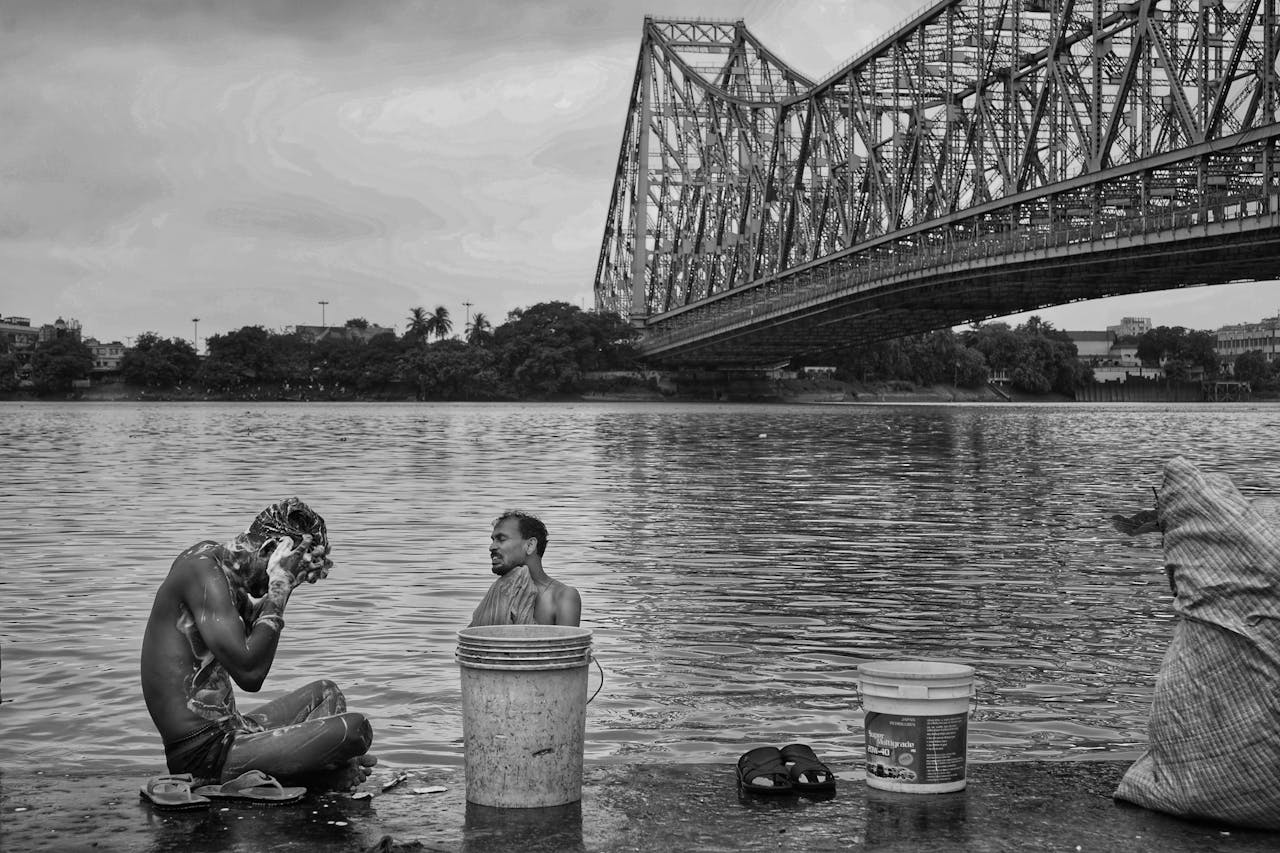 Men Bathing in River